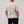 Cotton Baseball Jersey Bone, back view with chinos