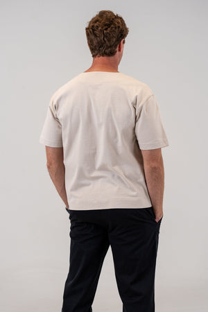Cotton Baseball Jersey Bone, back view with chinos