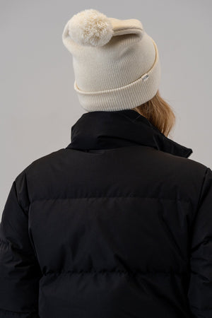 Women's Puffer Jacket Black with Pom Pom Beanie Natural, back view
