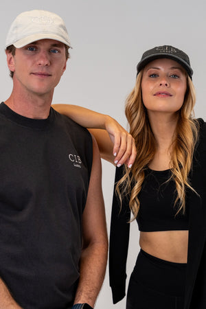 Washed Cotton Dad Cap Natural and Charcoal, worn together