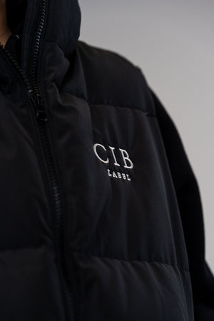 Women's 630-Fill Down Puffer Vest Black, logo detail