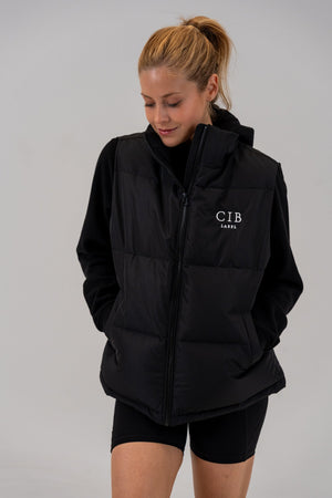 Women's 630-Fill Down Puffer Vest Black, front, hands in pockets